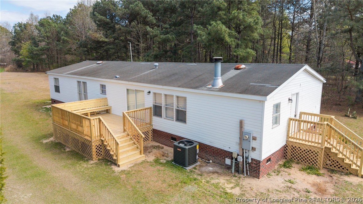 515 Mt Zion Road Red Springs, NC 28377 - Photo 41 of 50 a view of a house with a backyard and roof