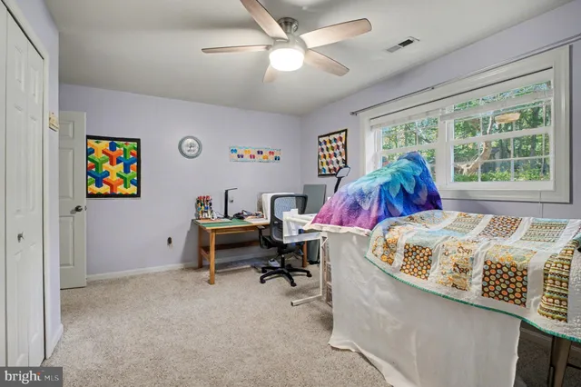 a workspace with furniture and window