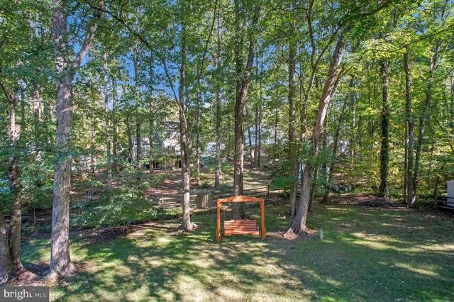 front view of a house with a big yard
