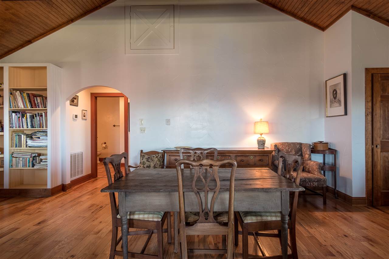 9240 Dick Woods Road Afton, VA 22920 - Photo 13 of 40 a view of a dining room with furniture and wooden floor