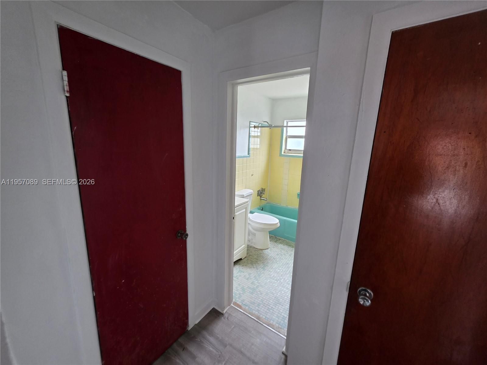 45 East 11th Street, Unit 21 Hialeah, FL 33010 - Photo 12 of 19 Hallway, linen closet and bathroom entrance