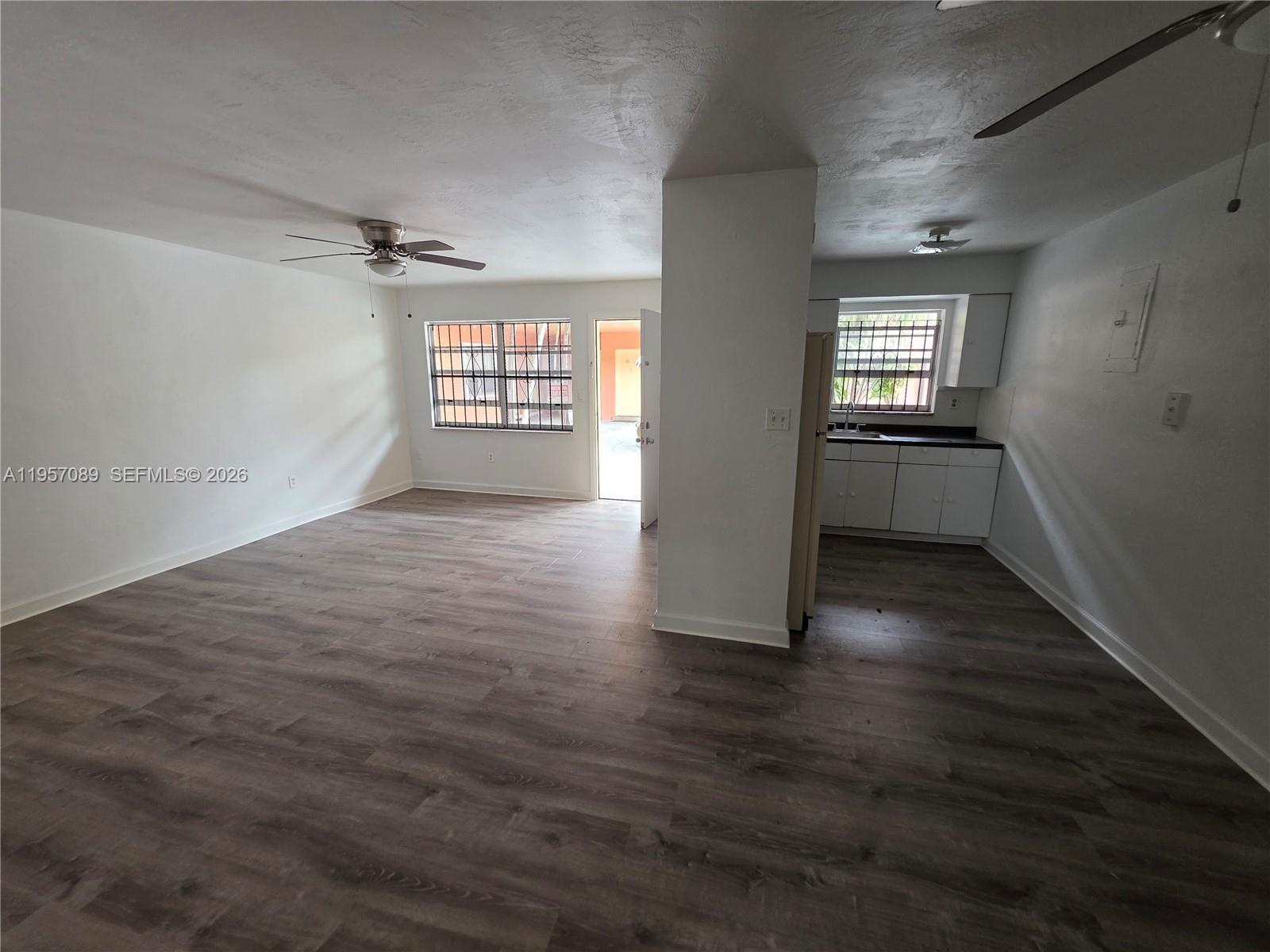 45 East 11th Street, Unit 21 Hialeah, FL 33010 - Photo 6 of 19 Living/Dining room and kitchen