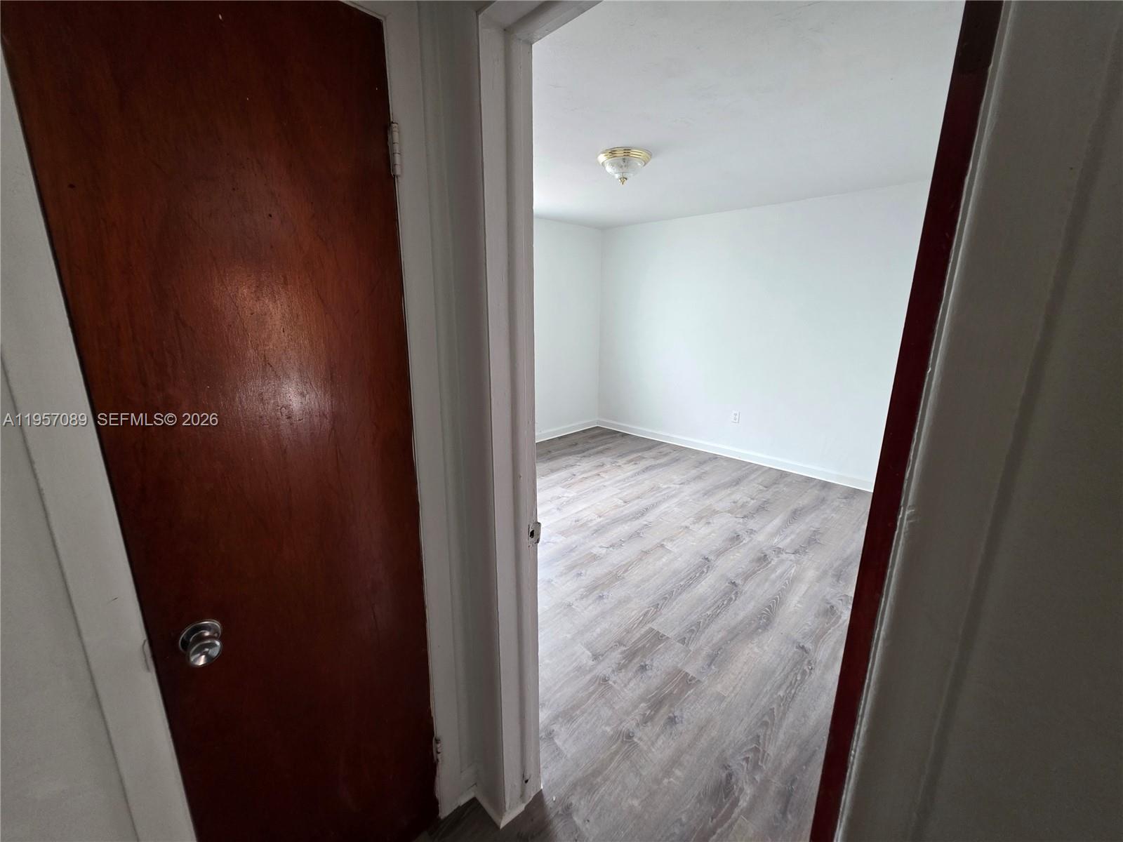 45 East 11th Street, Unit 21 Hialeah, FL 33010 - Photo 9 of 19 Closet and bedroom entrance