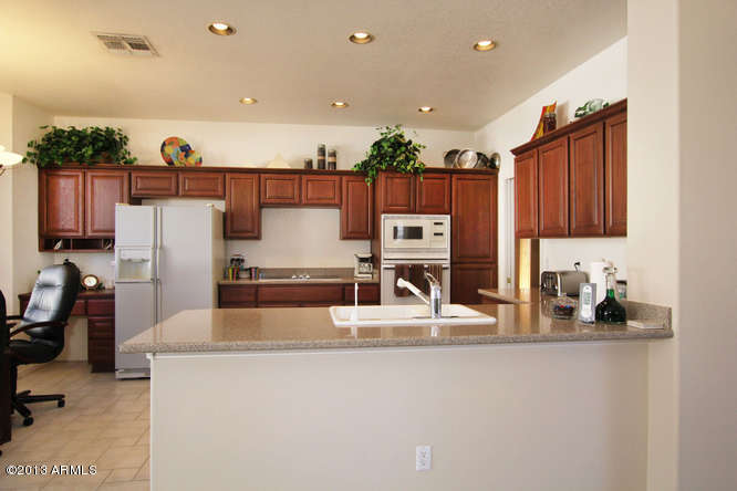 15694 Piccadilly Road Goodyear, AZ 85395 - Photo 3 of 16 Kitchen/Stone Counters