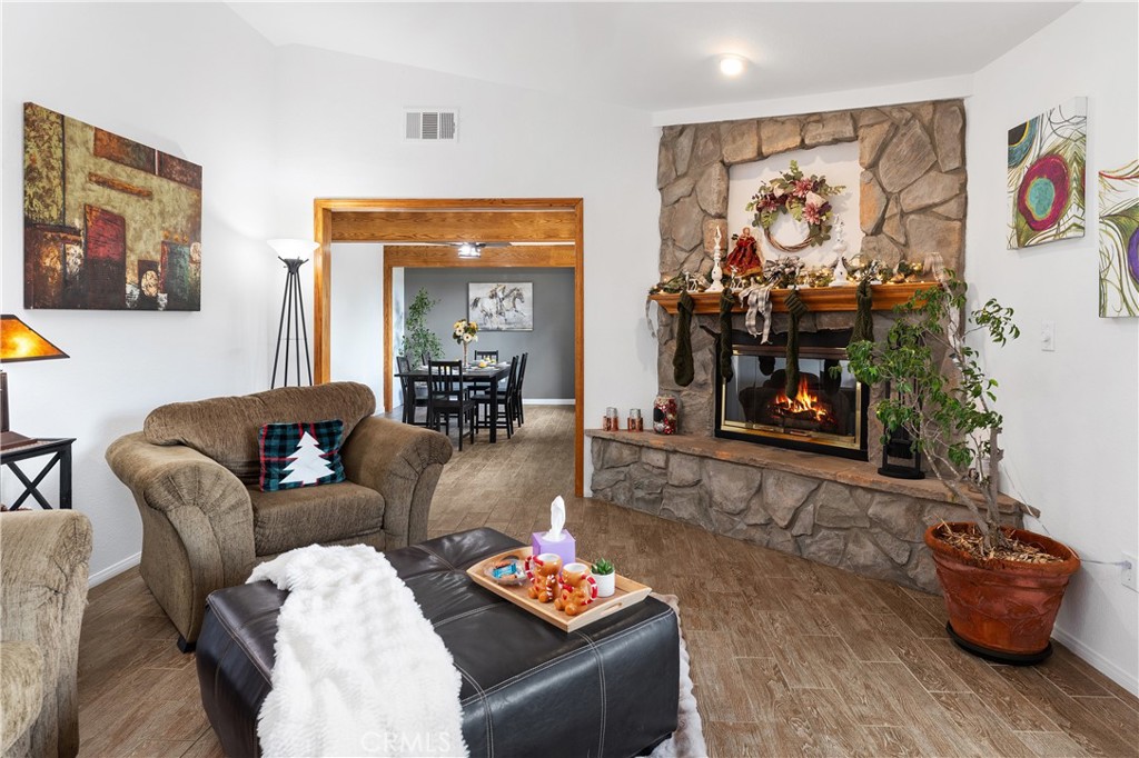 10526 Rainbrook Drive Fallbrook, CA 92028 - Photo 13 of 63 a living room with furniture and a fireplace