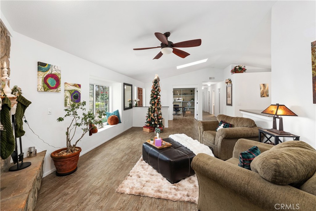 10526 Rainbrook Drive Fallbrook, CA 92028 - Photo 14 of 63 a living room with furniture and a flat screen tv