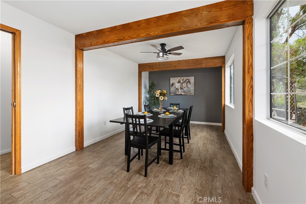10526 Rainbrook Drive Fallbrook, CA 92028 - Photo 15 of 63 a view of a dining room with furniture and wooden floor