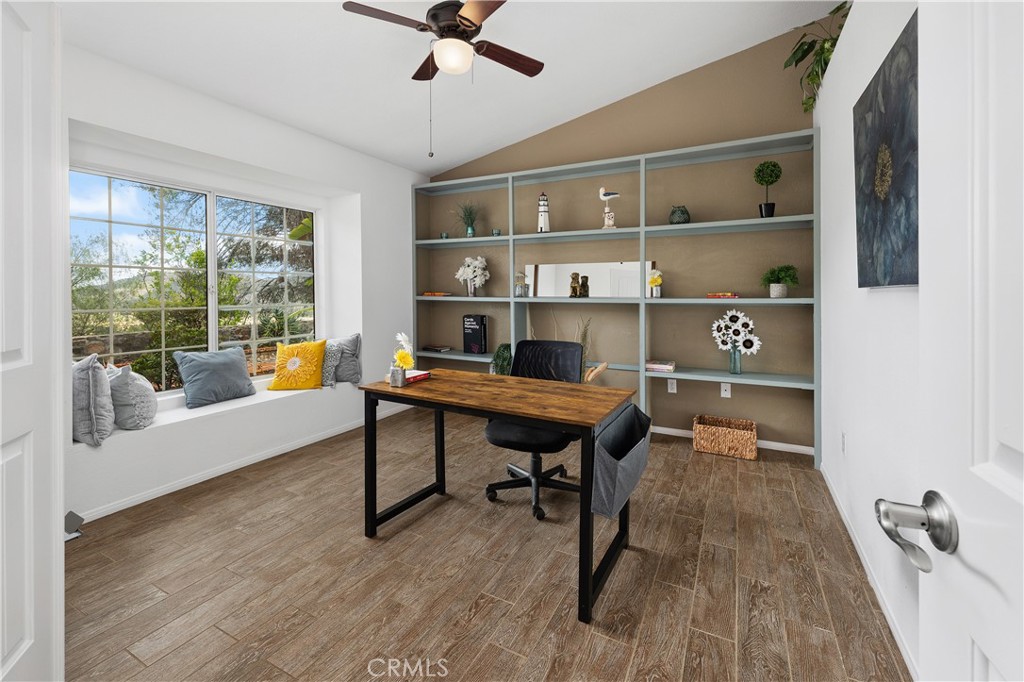 10526 Rainbrook Drive Fallbrook, CA 92028 - Photo 21 of 63 a view of a workspace with furniture window and wooden floor