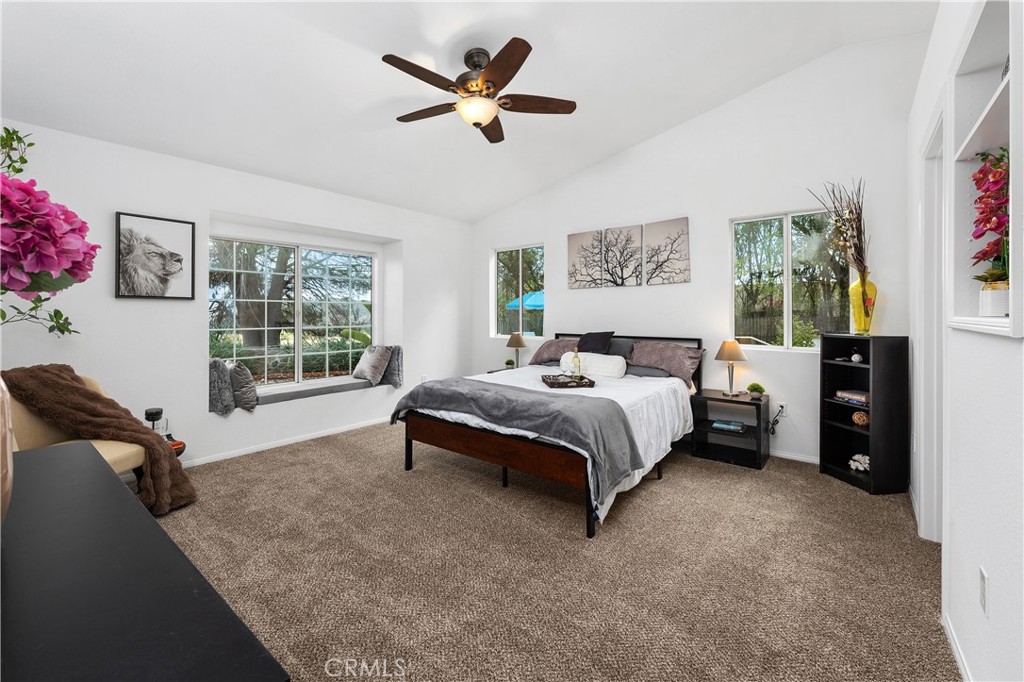 10526 Rainbrook Drive Fallbrook, CA 92028 - Photo 23 of 63 a bedroom with a bed dresser and a window