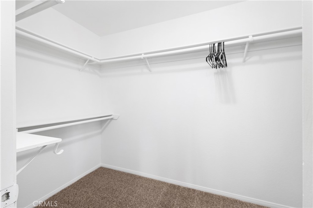 10526 Rainbrook Drive Fallbrook, CA 92028 - Photo 27 of 63 a view of a room with racks on the wall