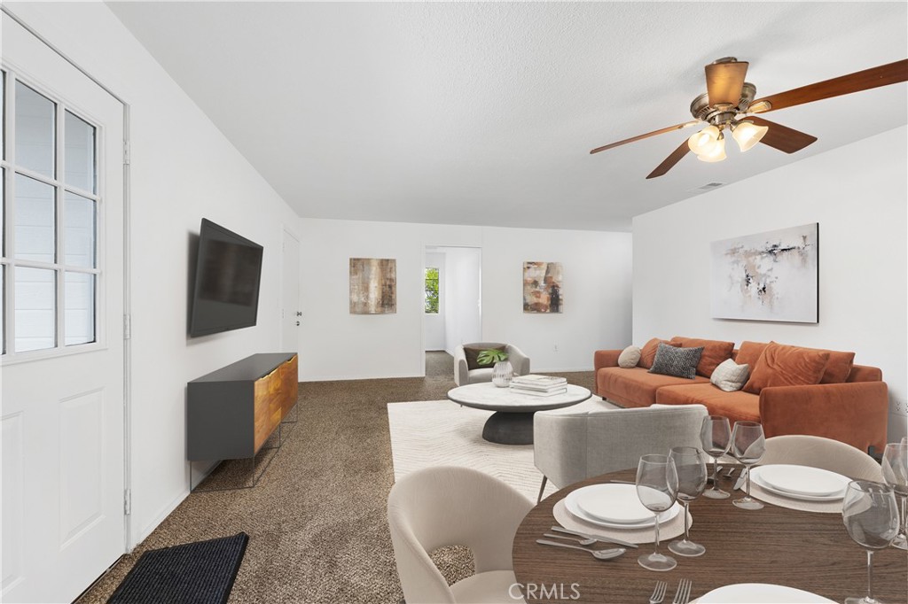 10526 Rainbrook Drive Fallbrook, CA 92028 - Photo 28 of 63 a living room with furniture and a flat screen tv