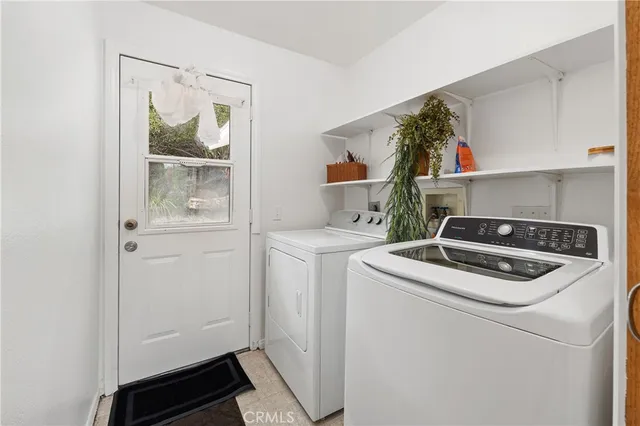 a view of a swimming pool with an outdoor seating