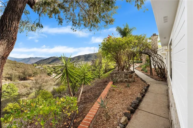 a view of mountain with lake view