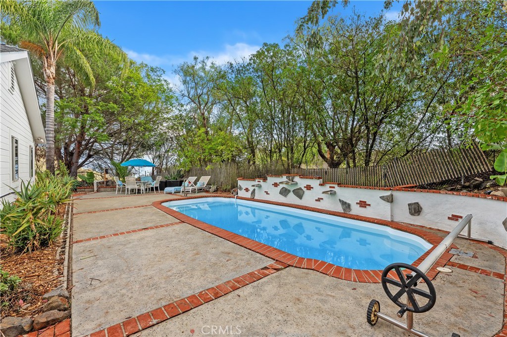 10526 Rainbrook Drive Fallbrook, CA 92028 - Photo 43 of 63 a view of a swimming pool with chairs