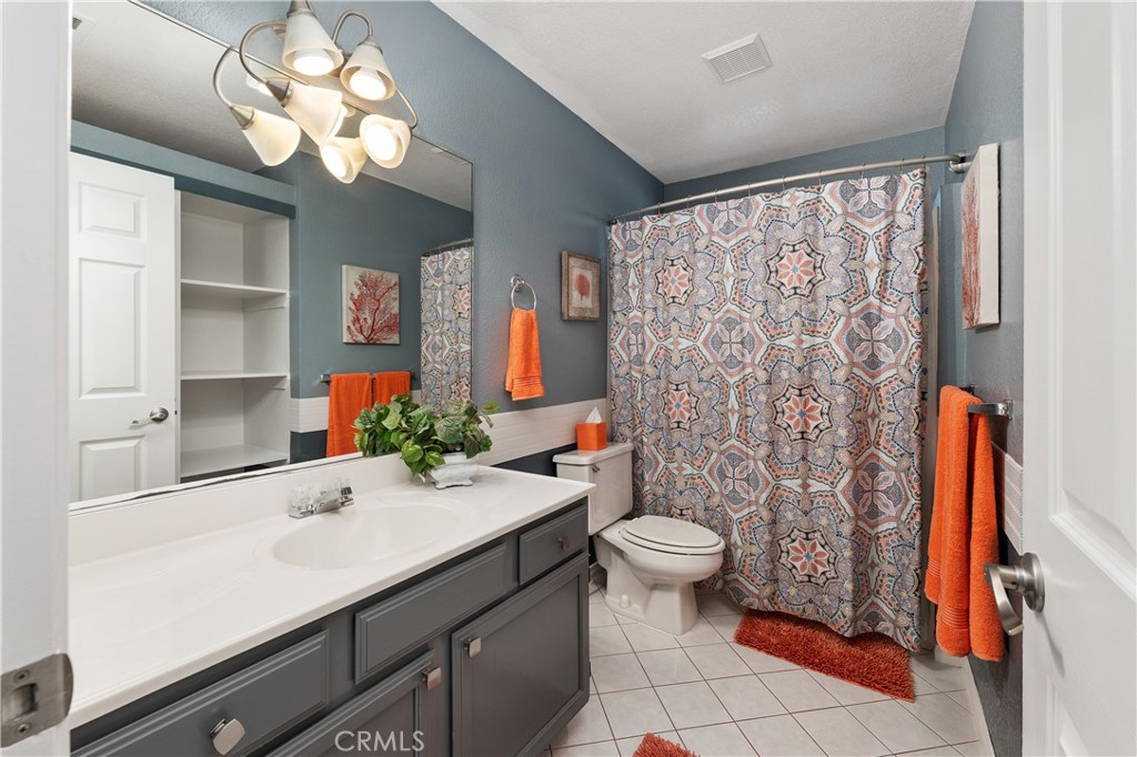 10526 Rainbrook Drive Fallbrook, CA 92028 - Photo 45 of 63 a bathroom with a sink toilet and shower