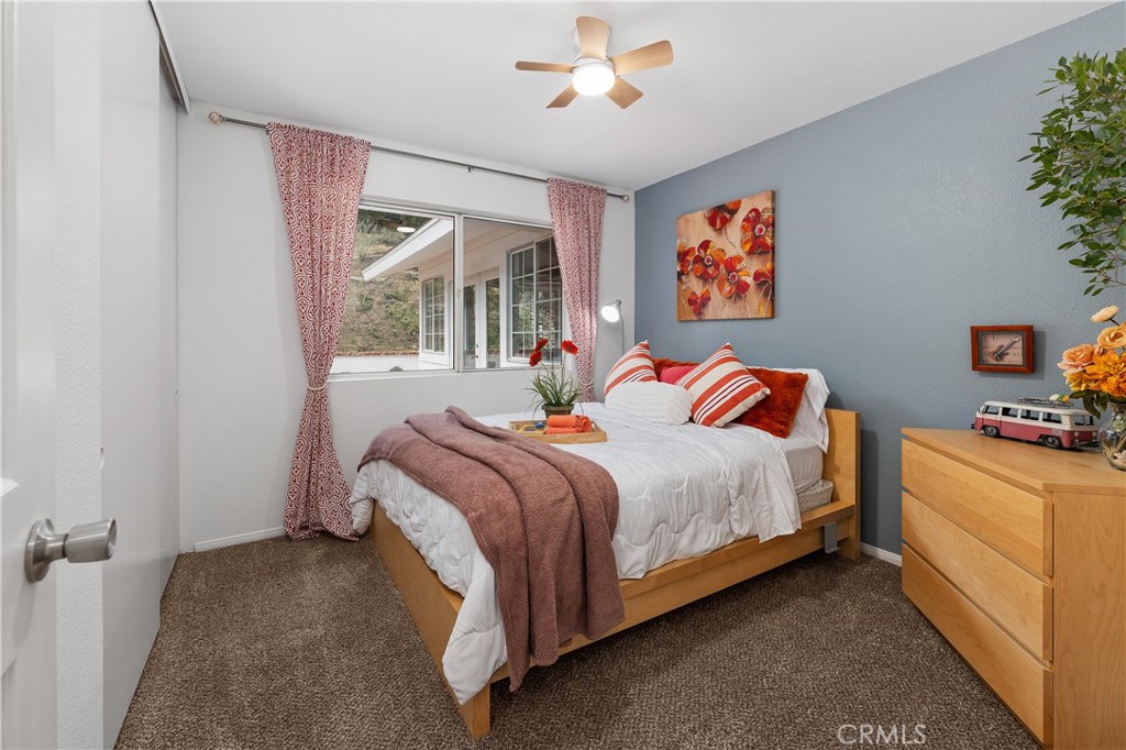 10526 Rainbrook Drive Fallbrook, CA 92028 - Photo 46 of 63 a bedroom with a bed and a window