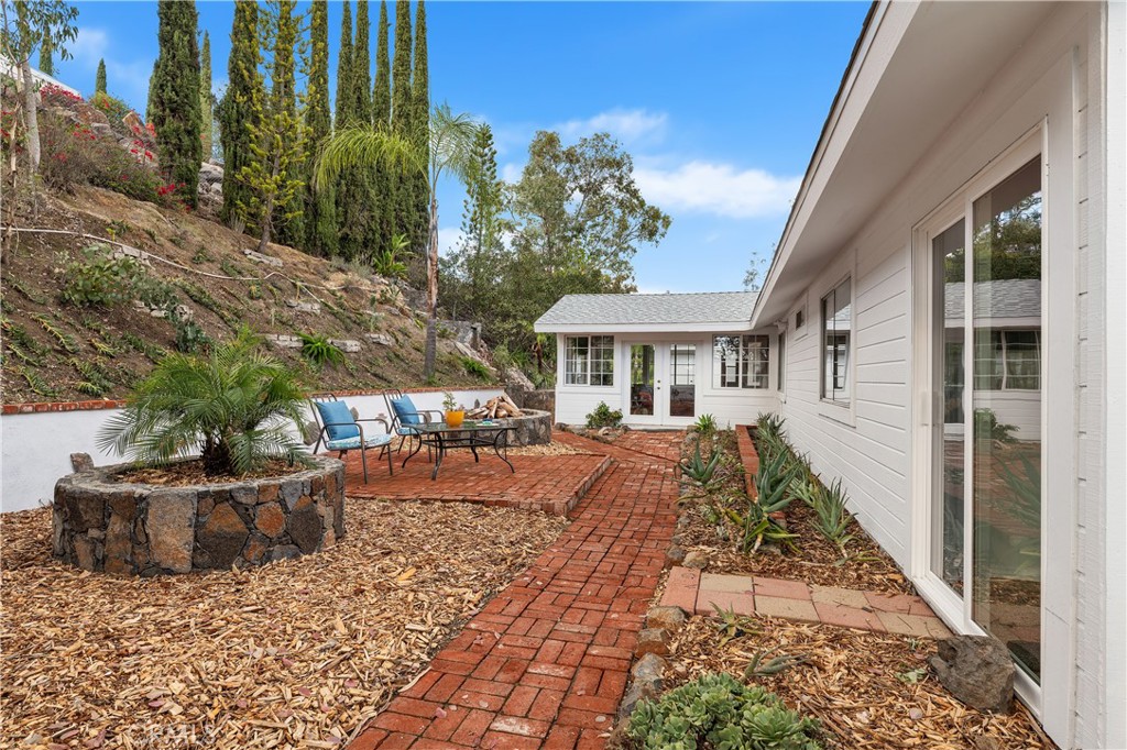 10526 Rainbrook Drive Fallbrook, CA 92028 - Photo 9 of 63 a front view of house with yard and green space