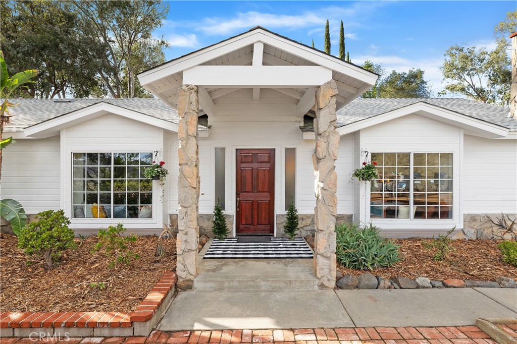 10526 Rainbrook Drive Fallbrook, CA 92028 - Photo 10 of 63 a front view of a house with a yard