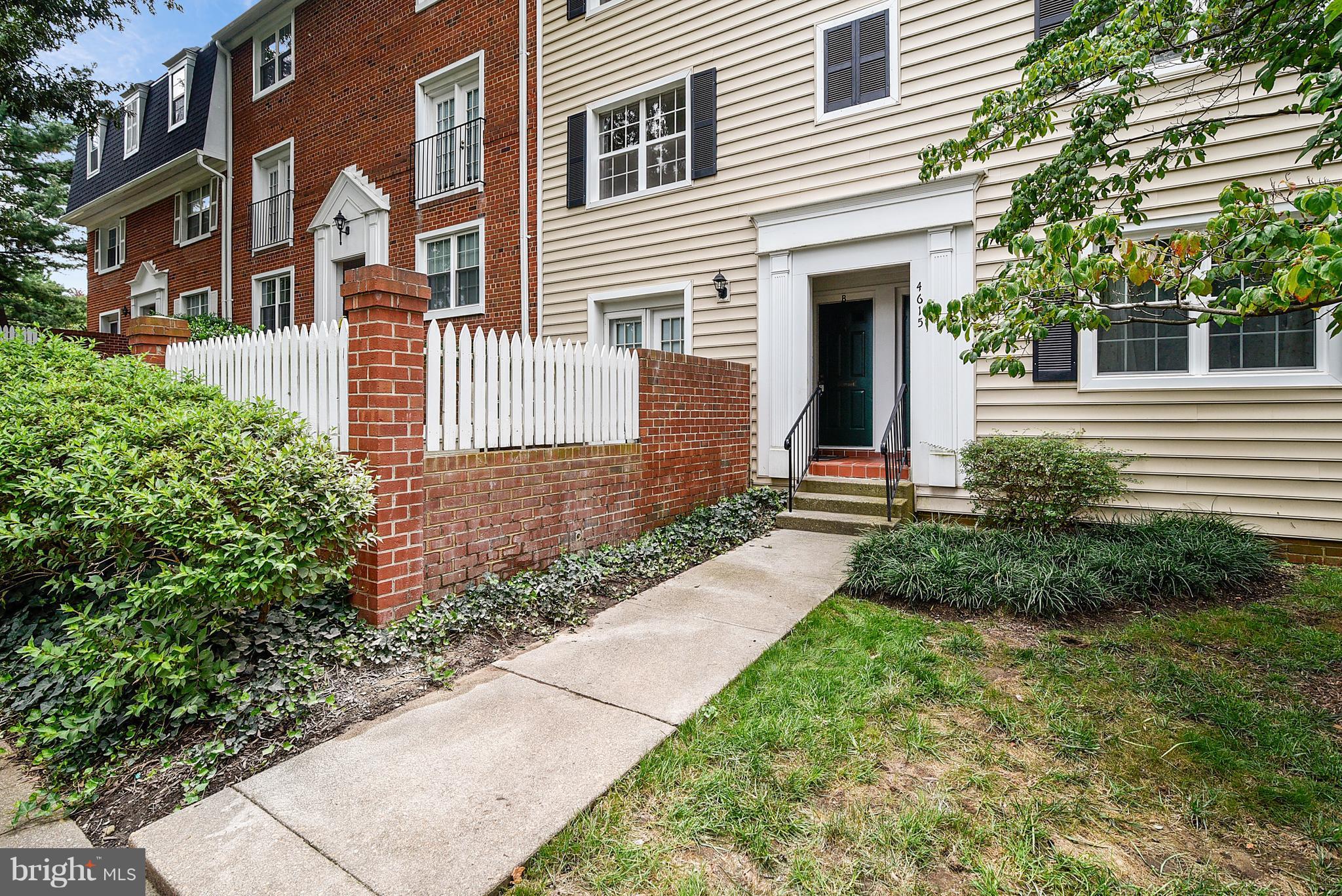4615 28th Road South, Unit B Arlington, VA 22206 - Photo 1 of 24 a front view of a house with garden