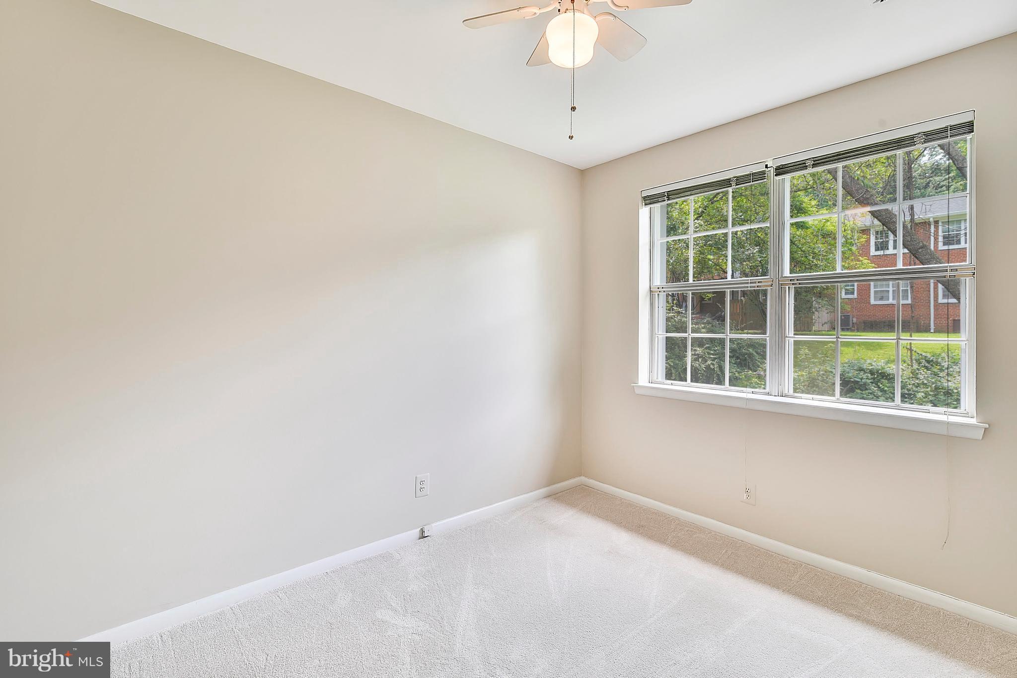 4615 28th Road South, Unit B Arlington, VA 22206 - Photo 9 of 24 an empty room with a window