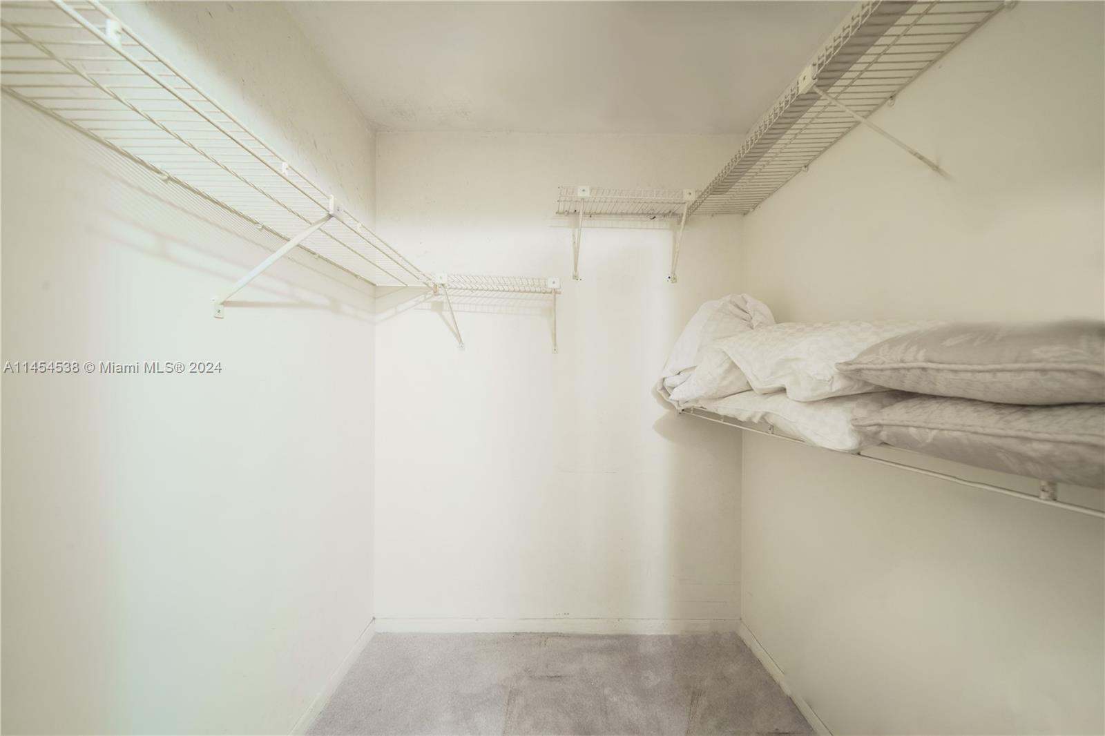 601 Ives Dairy Road, Unit 1038 Miami, FL 33179 - Photo 14 of 17 a bathroom with a shower