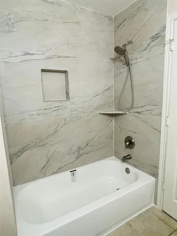 a view of living room with patio furniture and garden