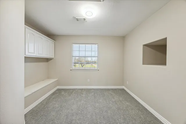 a view of a swimming pool and lounge chair