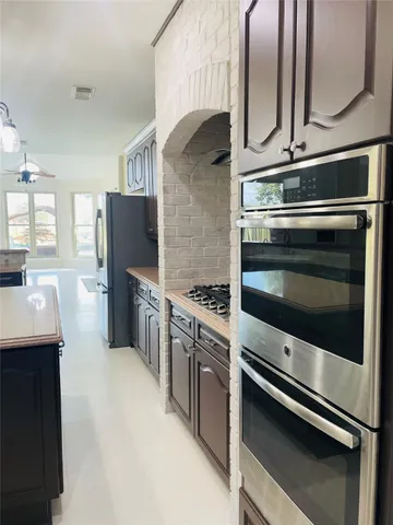 a spacious bathroom with a double vanity sink mirror and double