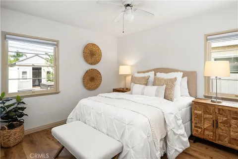 a bedroom with bed and a window