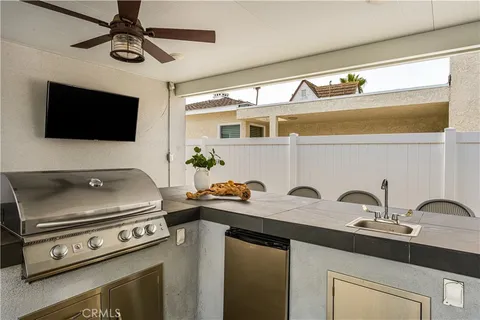 a kitchen with a stove and a sink