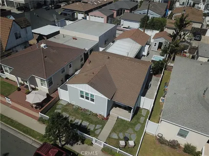 an aerial view of a house with outdoor space
