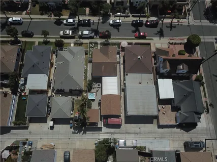 an aerial view of a house with outdoor space