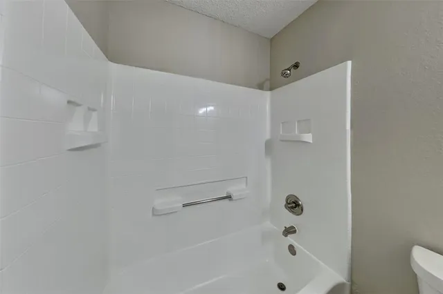 a bathroom with a bathtub