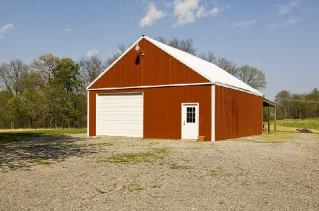 3669 Bethlehem Road Springfield, TN 37172 - Photo 18 of 19 The 30'x40' barn is wired for electricity, has a workshop, storage area, and enough room for cars, tractors, and other equipment. Mower and tractors are available for purchase as well.