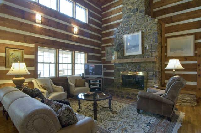3669 Bethlehem Road Springfield, TN 37172 - Photo 4 of 19 Relax in the great room with the rock mantle, gas fireplace. The walls are made of 8x12 white pine logs from North Carolina.