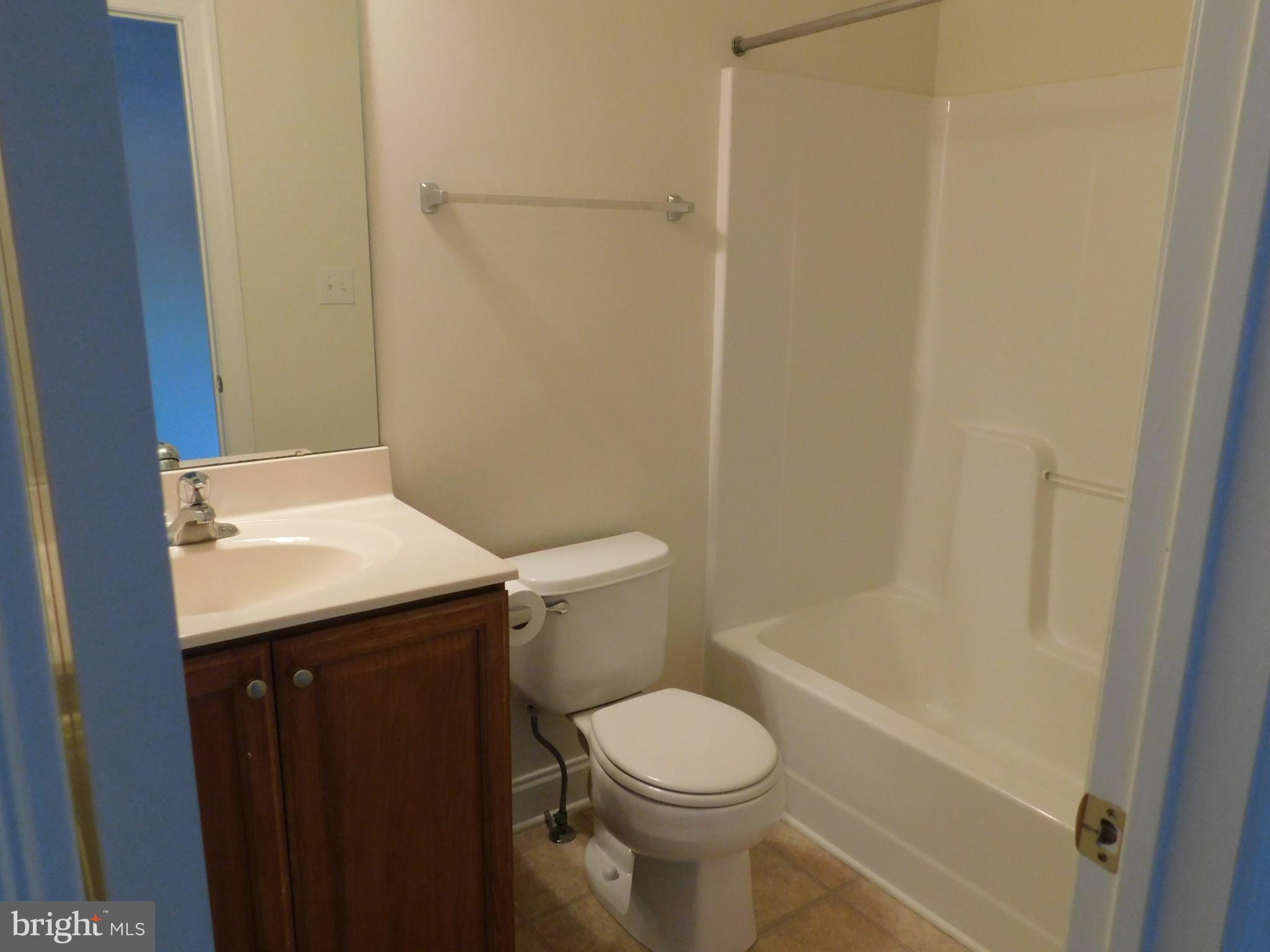 70 Sugar Maple Road Barto, PA 19504 - Photo 8 of 14 a bathroom with a sink a toilet and shower