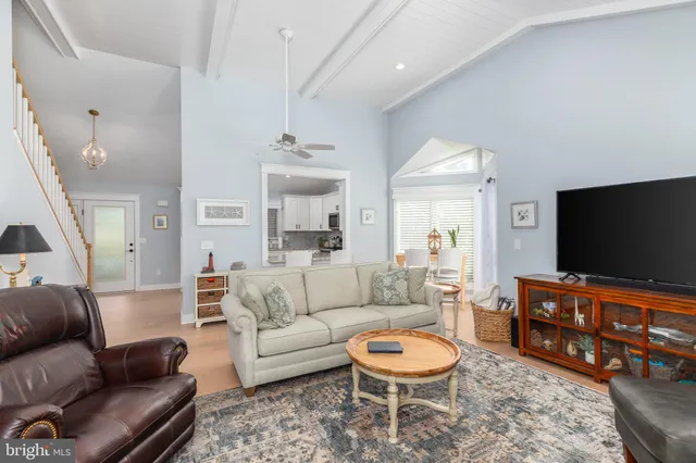 a kitchen with a sink cabinets and appliances