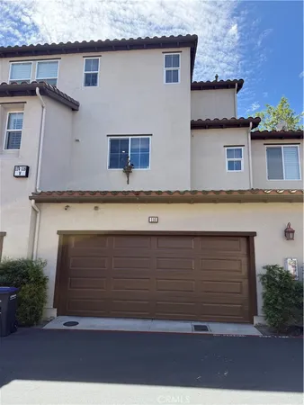 a view of a house with a garage