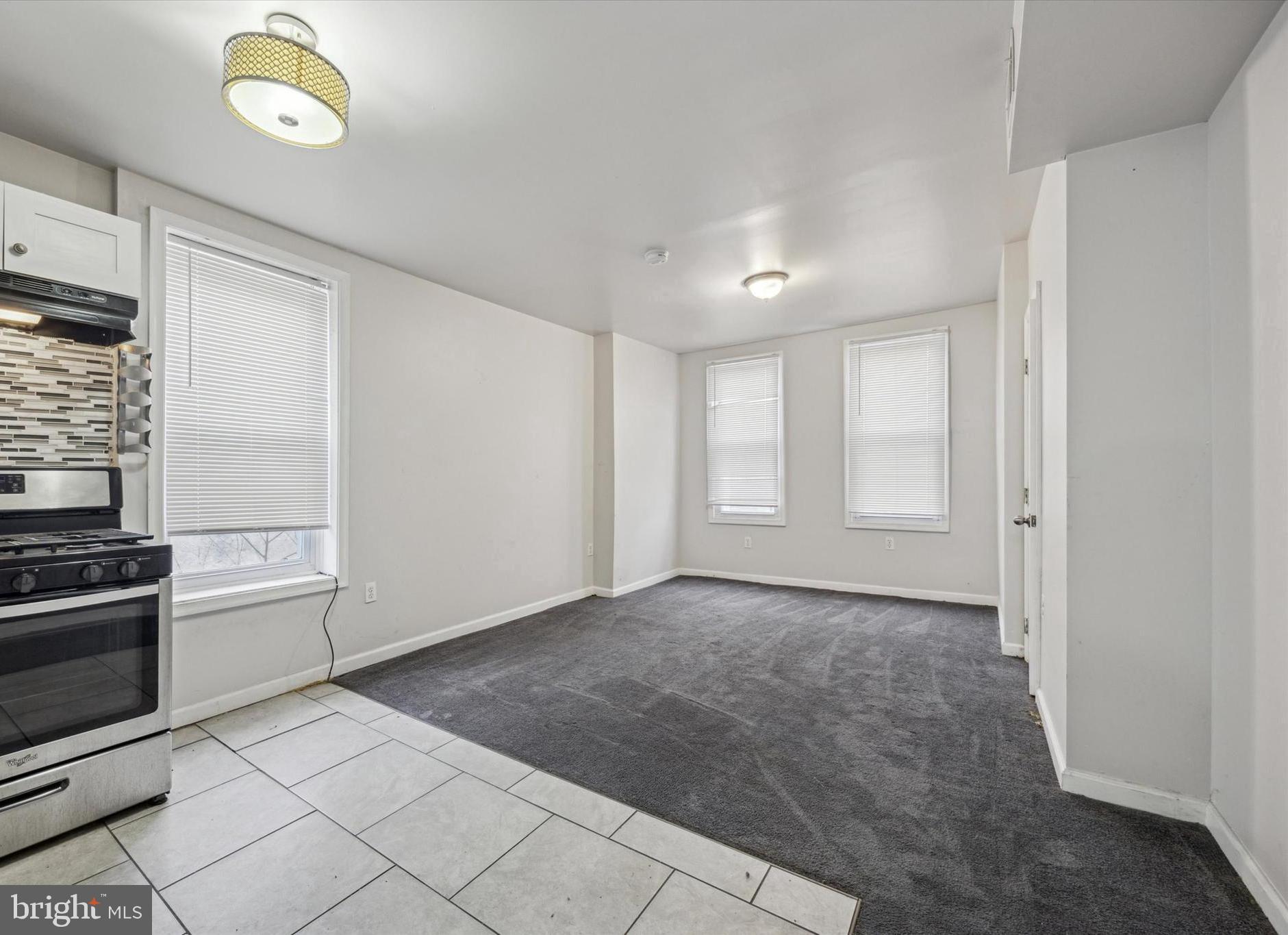 5739 Springfield Avenue Philadelphia, PA 19143 - Photo 2 of 16 a view of an empty room with a stove