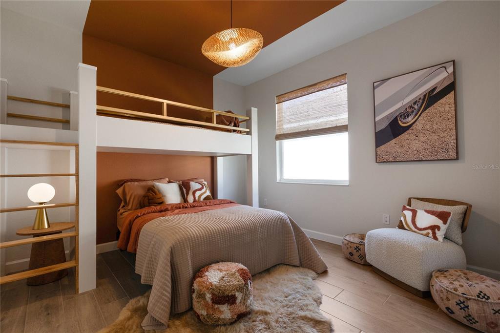 7157 Inlet Isles Lakewood Ranch, FL 34202 - Photo 20 of 26 a bedroom with bed and a window