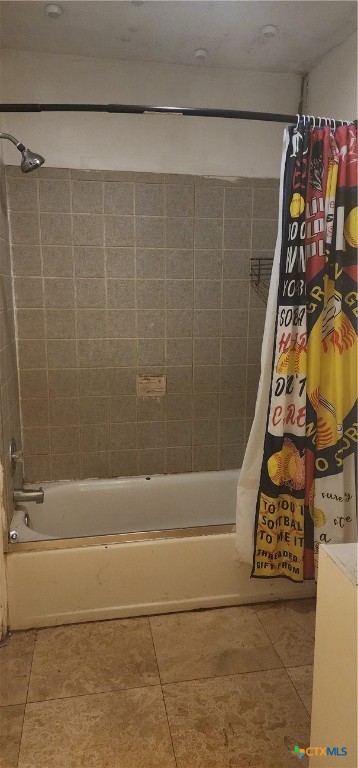 604 Davis Street Edna, TX 77957 - Photo 18 of 26 a bathroom with a bathtub and shower