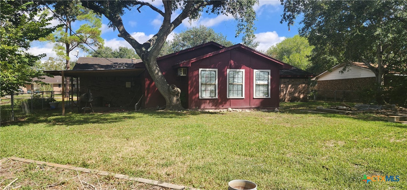 604 Davis Street Edna, TX 77957 - Photo 26 of 26 a front view of a house with a yard