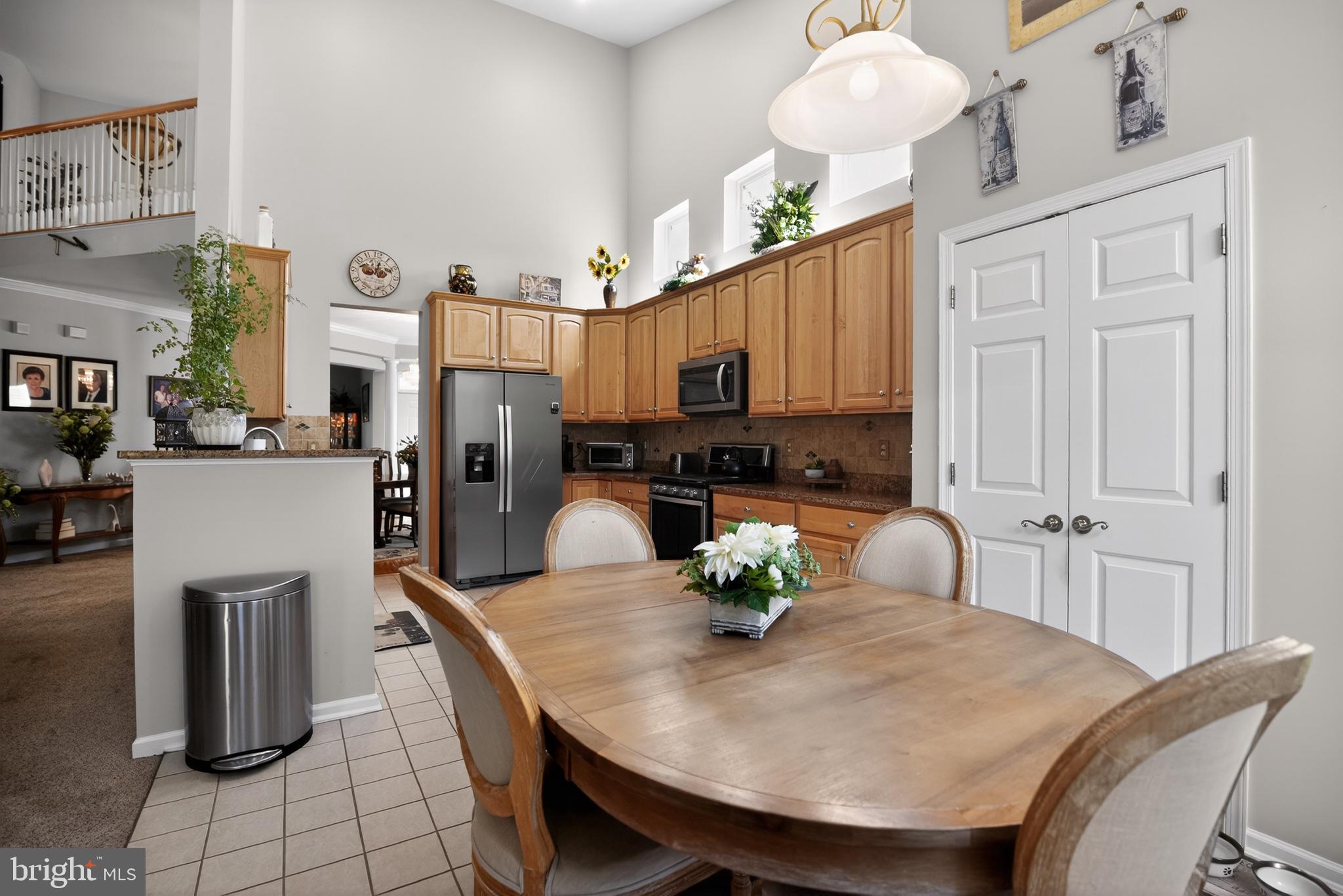9 Simpkins Lane Pemberton, NJ 08068 - Photo 21 of 36 Inviting kitchen with warm wood tones.