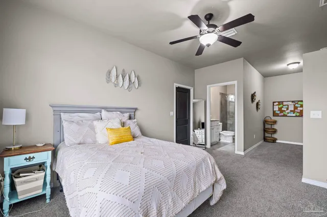 a kitchen with stainless steel appliances granite countertop a sink a stove and cabinets