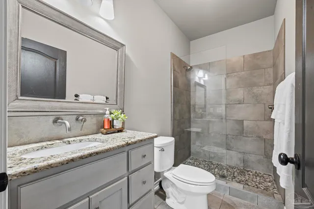 a kitchen with a refrigerator stove and sink