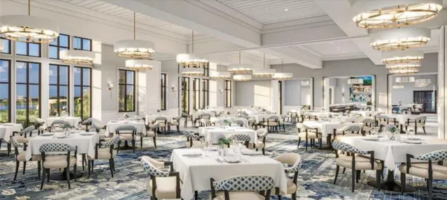 a dining room with furniture and garden view