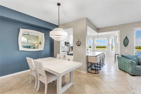 a view of a dining room with furniture