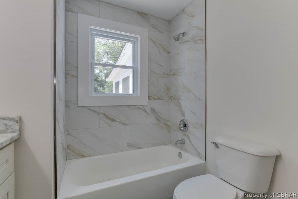 400 Showalter Road Yorktown, VA 23692 - Photo 34 of 49 Full bathroom featuring vanity, tiled shower / bath, and toilet