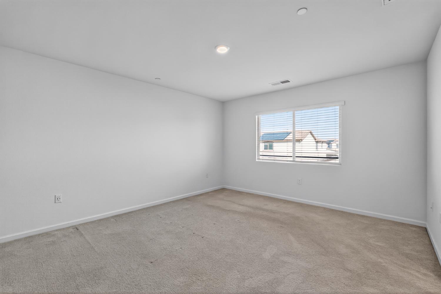 12829 Scholarly Way Rancho Cordova, CA 95742 - Photo 11 of 33 an empty room with windows