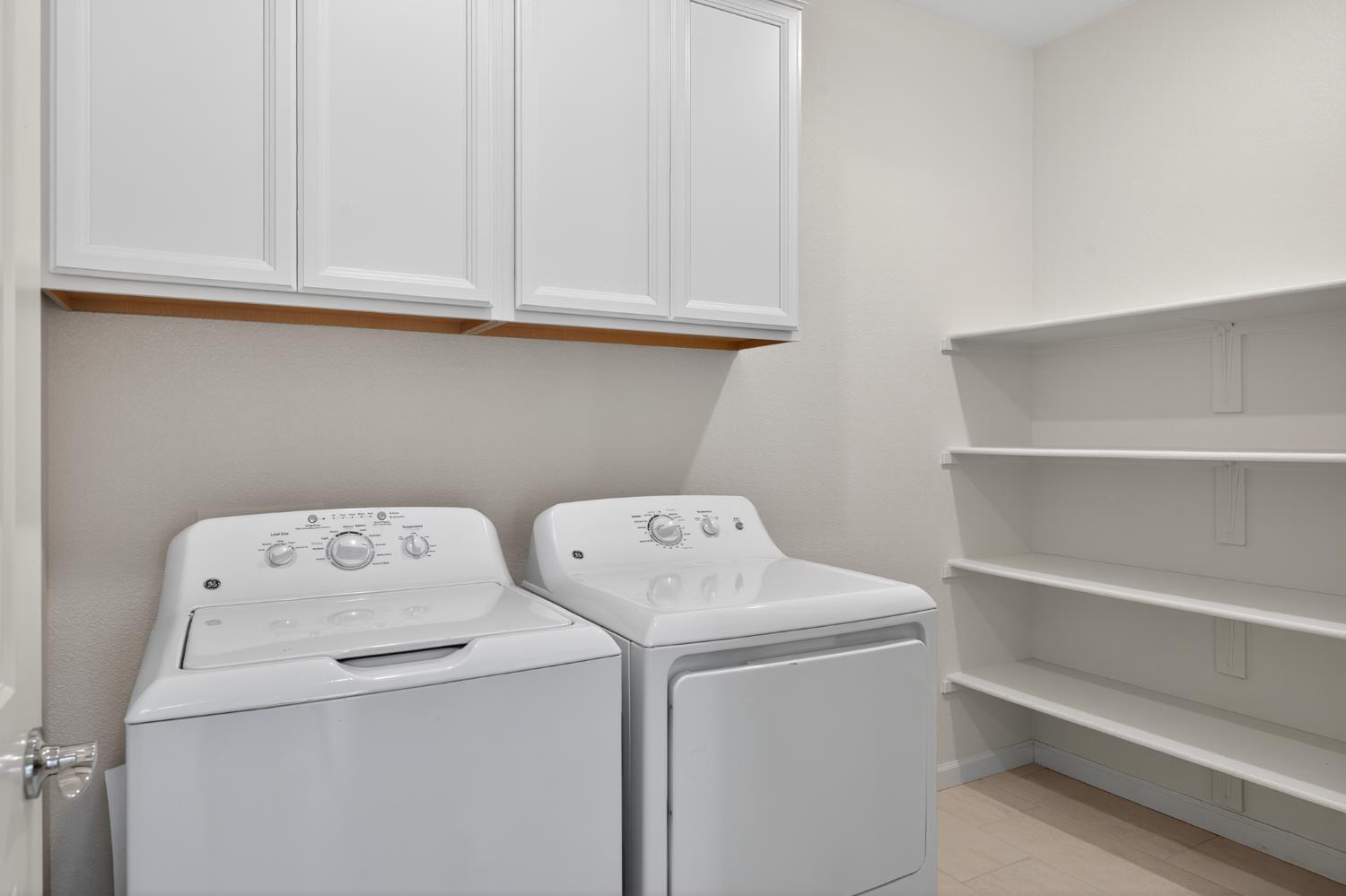 12829 Scholarly Way Rancho Cordova, CA 95742 - Photo 29 of 33 a utility room with dryer and washer